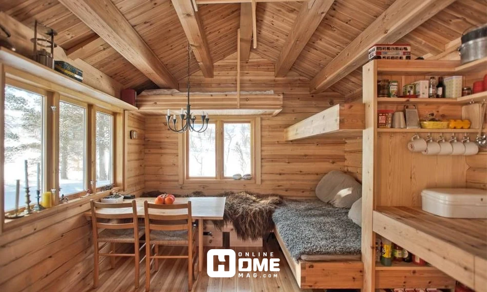 cozy wooden cabin interior with a dining table, built-in shelves, and large windows allowing natural light to enter, creating a warm atmosphere.