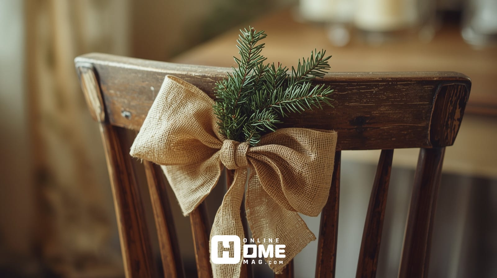 Rustic table decorations Christmas style featuring dining chair with burlap bow and evergreen sprig for farmhouse elegance 