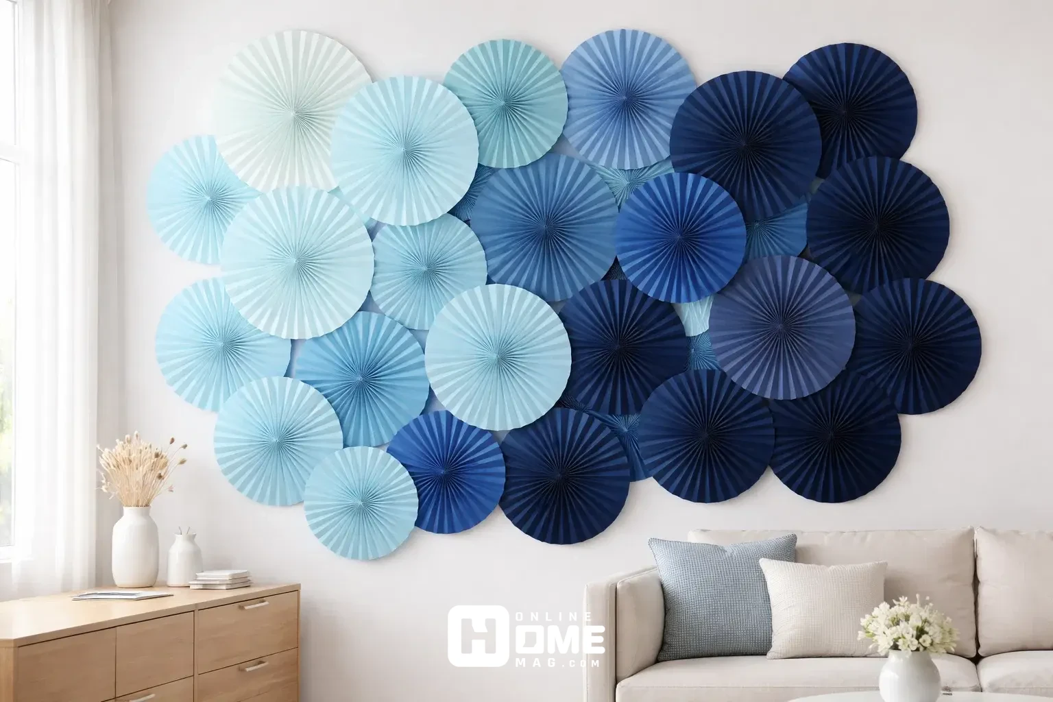 Geometric wall of paper rosette fans in ombre blue shades from light to dark